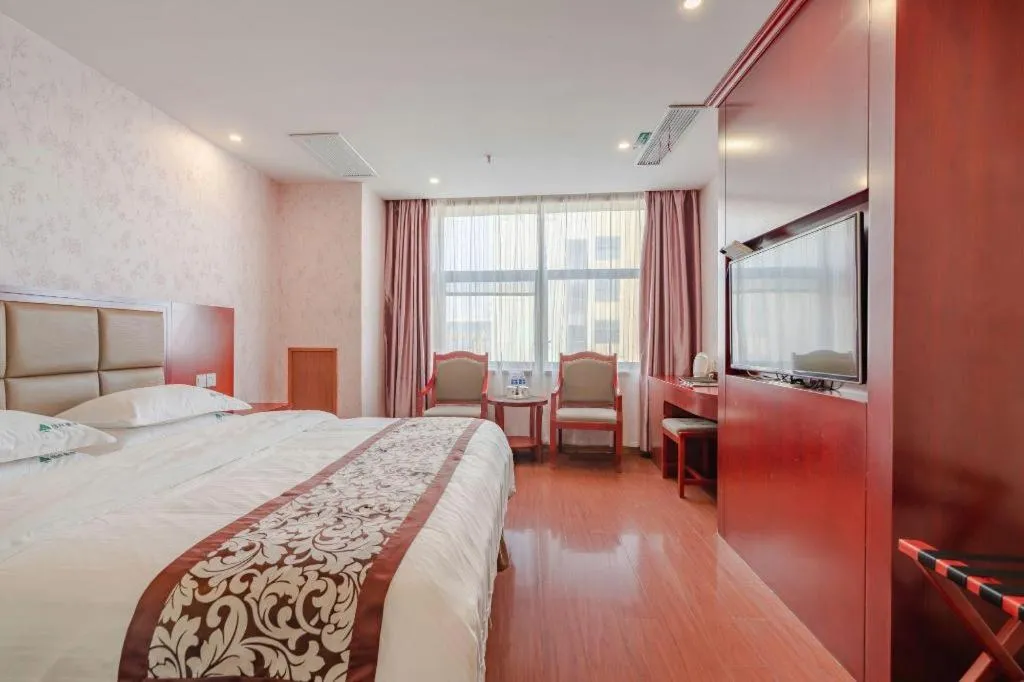 Bed in GreenTree Inn Chuzhou City Quanjiao County High-Speed Italy Trade City Business Hotel