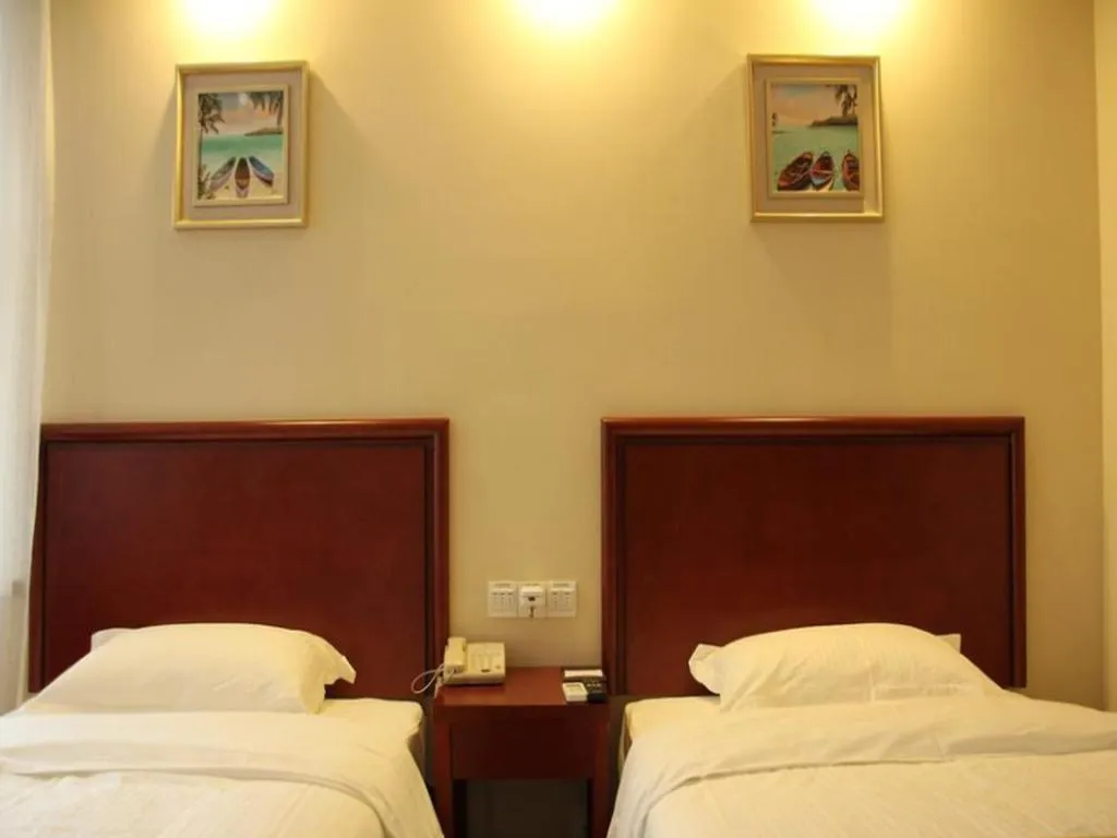 Bed in GreenTree Inn Chuzhou City Quanjiao County High-Speed Italy Trade City Business Hotel