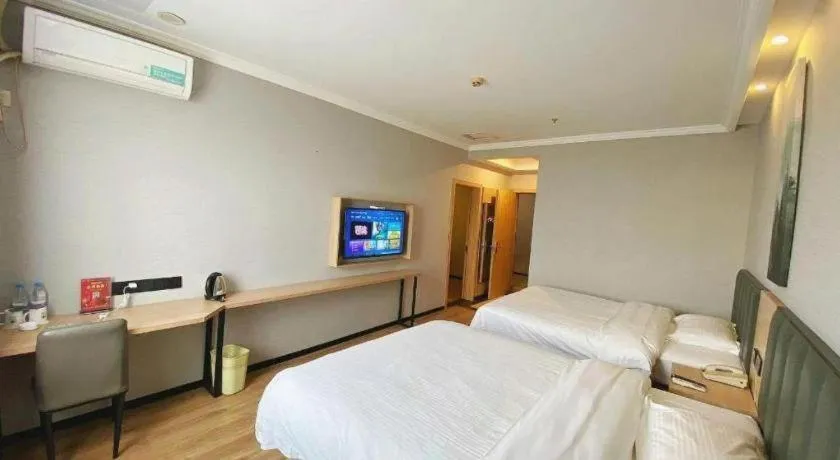 Bed in GreenTree Inn Taizhou New District Hospital of Renmin Hospital Mingliu Express Hotel