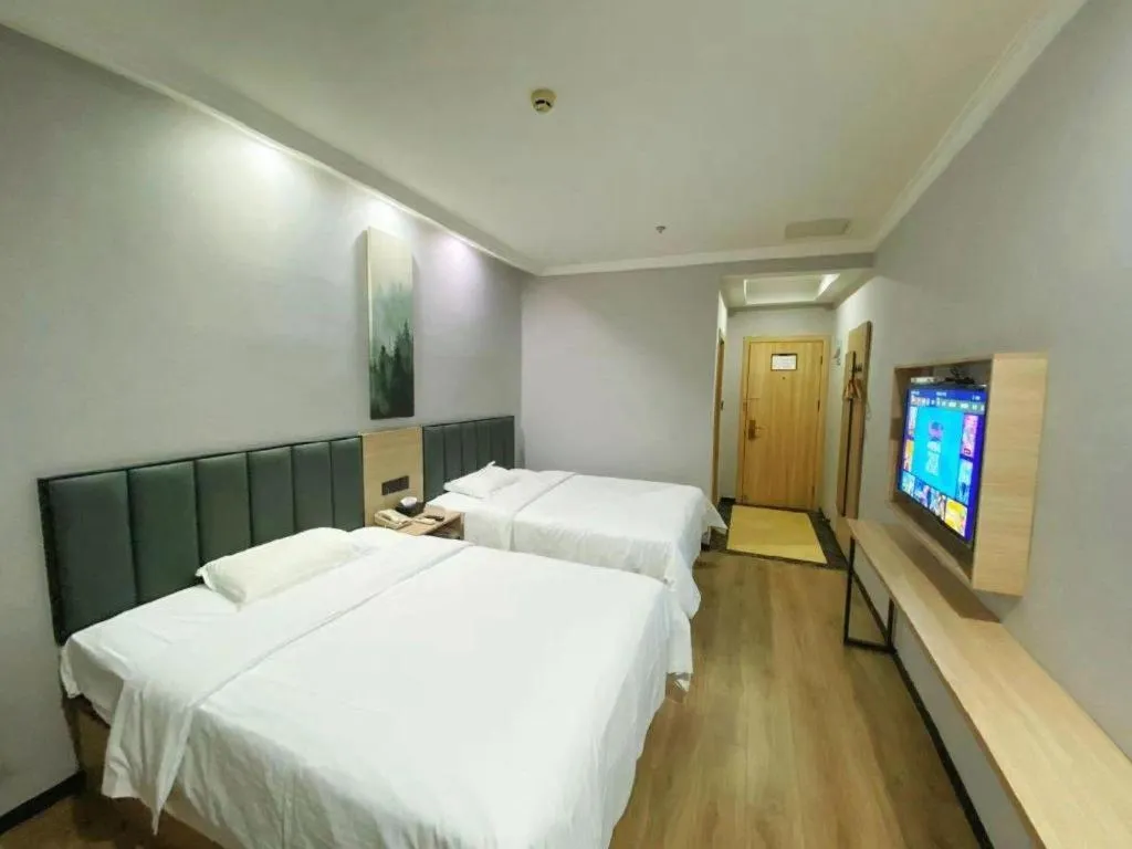 Bed in GreenTree Inn Taizhou New District Hospital of Renmin Hospital Mingliu Express Hotel