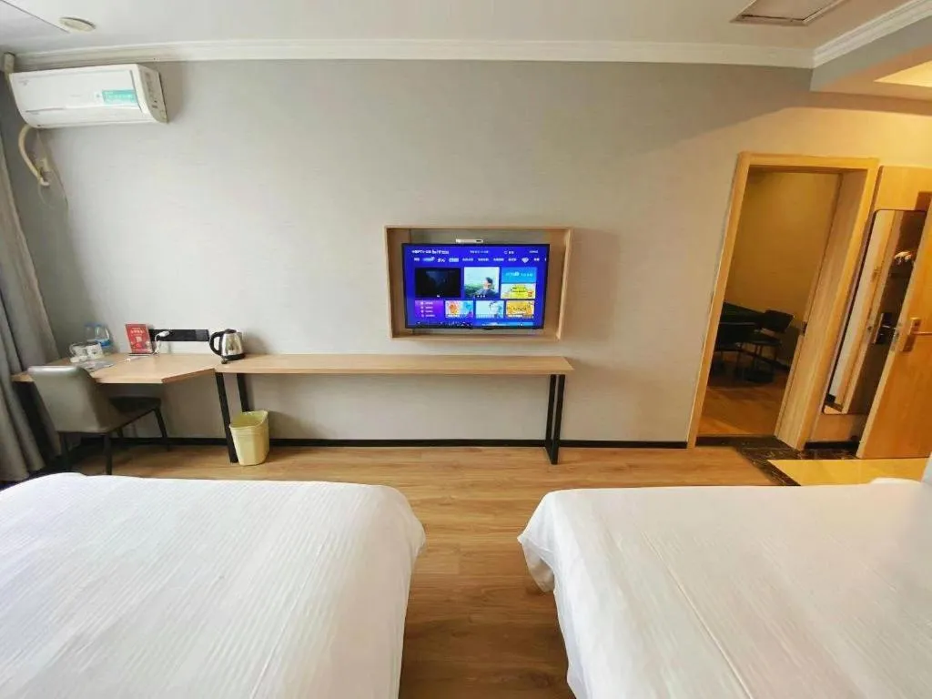Bed in GreenTree Inn Taizhou New District Hospital of Renmin Hospital Mingliu Express Hotel