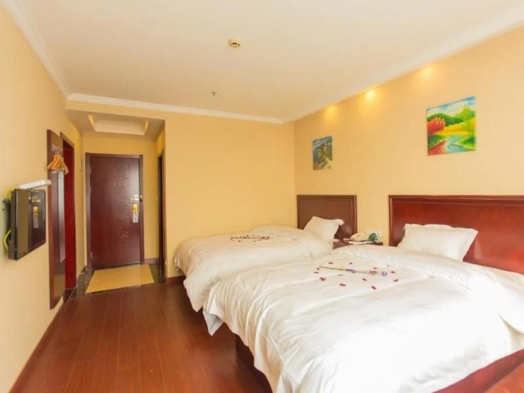 Bed in GreenTree Inn Taizhou New District Hospital of Renmin Hospital Mingliu Express Hotel