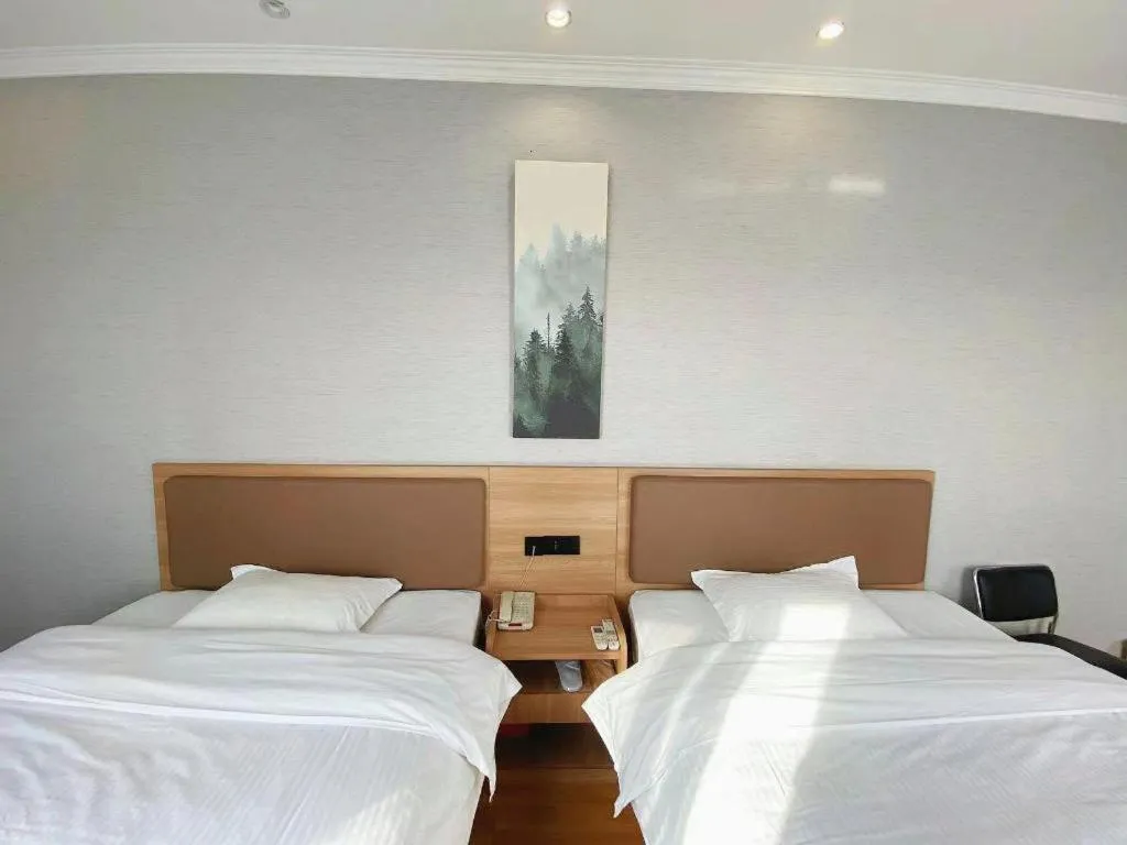 Bed in GreenTree Inn Taizhou New District Hospital of Renmin Hospital Mingliu Express Hotel