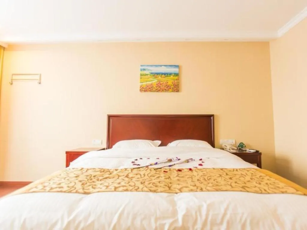 Bed in GreenTree Inn Taizhou New District Hospital of Renmin Hospital Mingliu Express Hotel