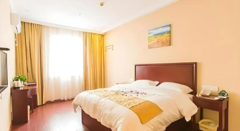 Bed in GreenTree Inn Taizhou New District Hospital of Renmin Hospital Mingliu Express Hotel