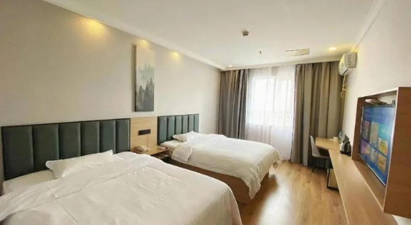 Bed in GreenTree Inn Taizhou New District Hospital of Renmin Hospital Mingliu Express Hotel