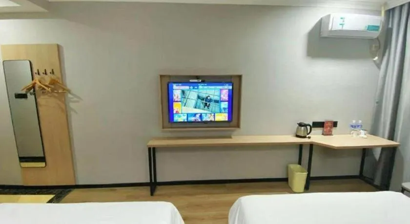 Bed in GreenTree Inn Taizhou New District Hospital of Renmin Hospital Mingliu Express Hotel