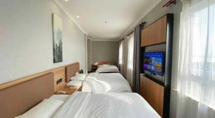 Bed in GreenTree Inn Taizhou New District Hospital of Renmin Hospital Mingliu Express Hotel