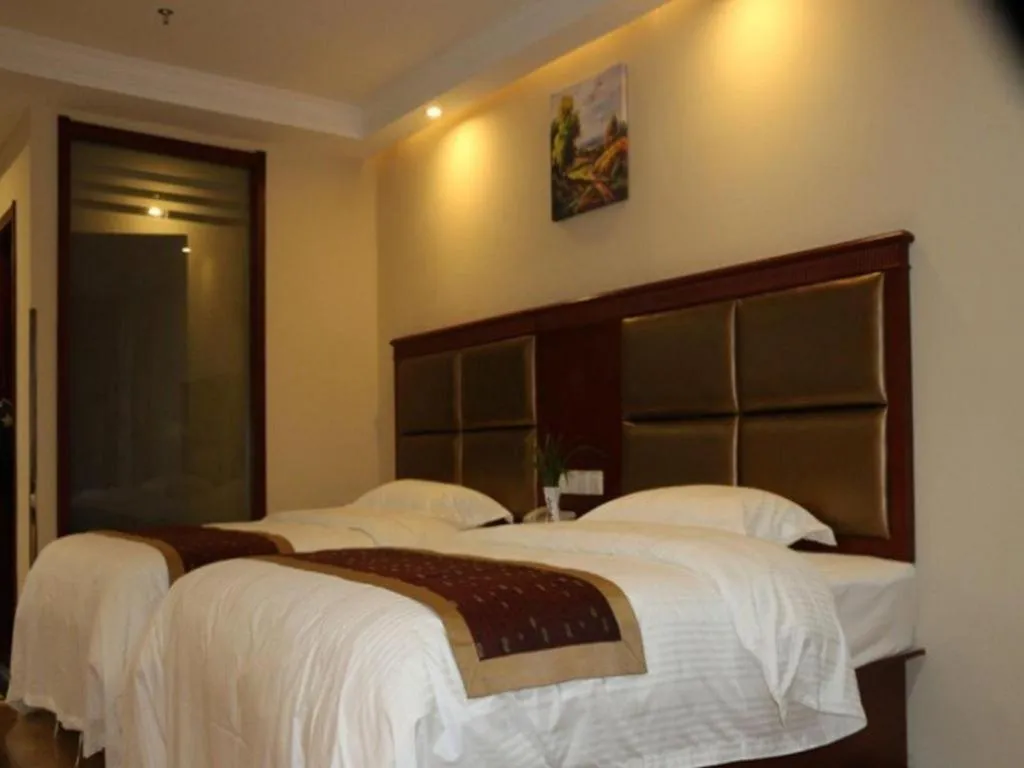 Bed in GreenTree Inn Taizhou New District Hospital of Renmin Hospital Mingliu Express Hotel