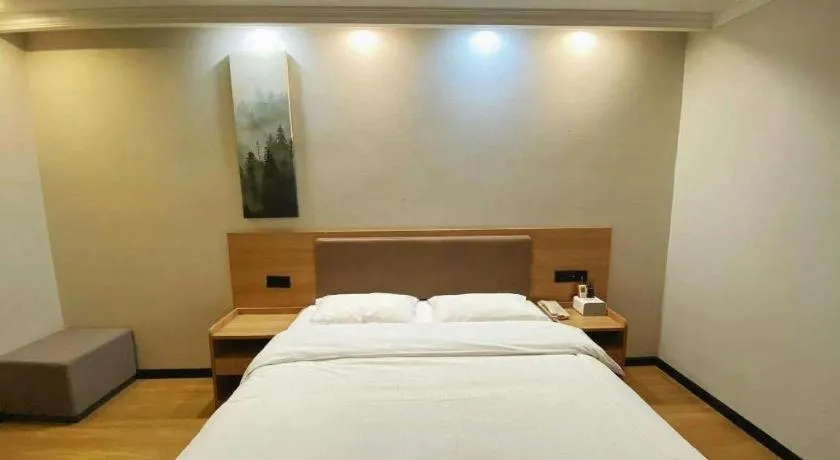 Bed in GreenTree Inn Taizhou New District Hospital of Renmin Hospital Mingliu Express Hotel