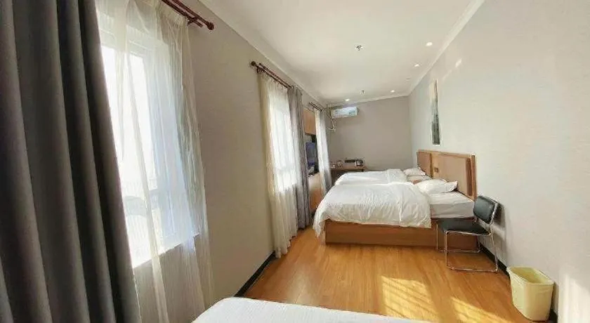 Bed in GreenTree Inn Taizhou New District Hospital of Renmin Hospital Mingliu Express Hotel