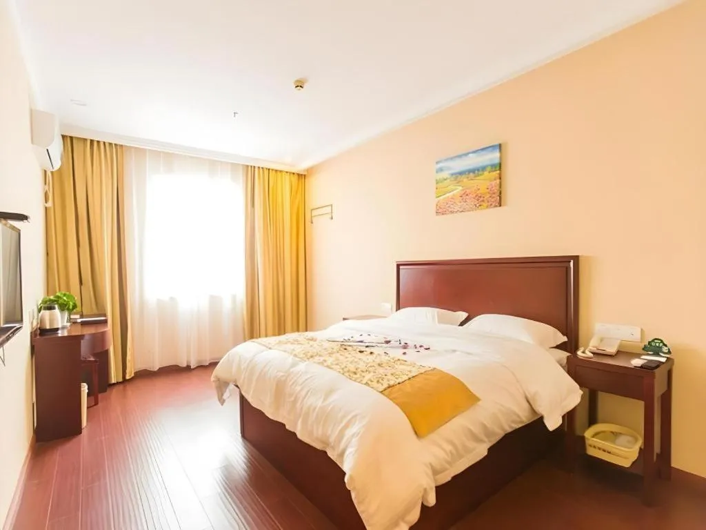Bed in GreenTree Inn Taizhou New District Hospital of Renmin Hospital Mingliu Express Hotel