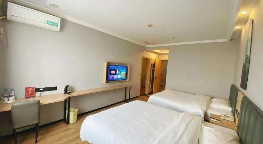 Bed in GreenTree Inn Taizhou New District Hospital of Renmin Hospital Mingliu Express Hotel