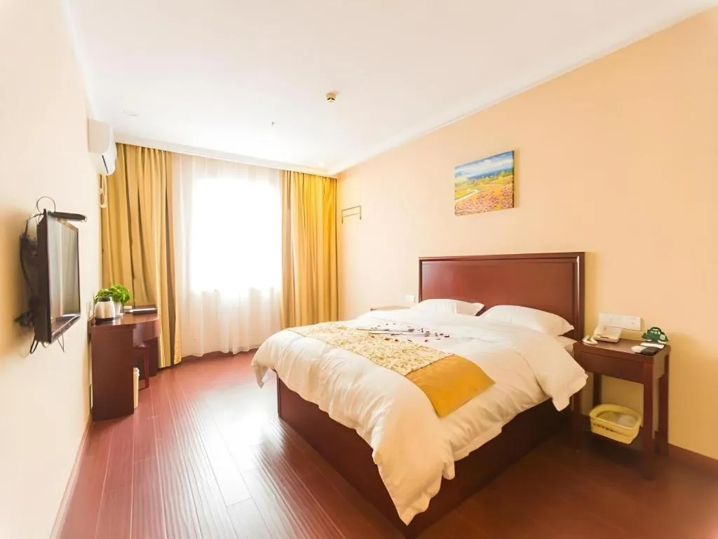 Bed in GreenTree Inn Taizhou New District Hospital of Renmin Hospital Mingliu Express Hotel