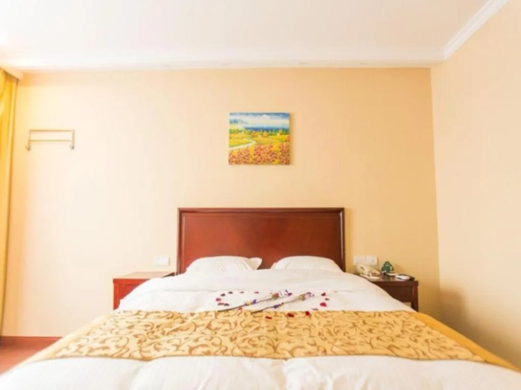 Bed in GreenTree Inn Taizhou New District Hospital of Renmin Hospital Mingliu Express Hotel