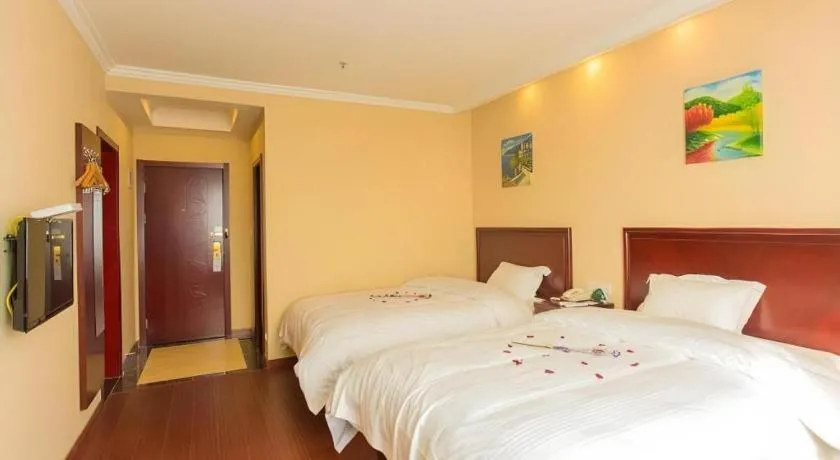 Bed in GreenTree Inn Taizhou New District Hospital of Renmin Hospital Mingliu Express Hotel