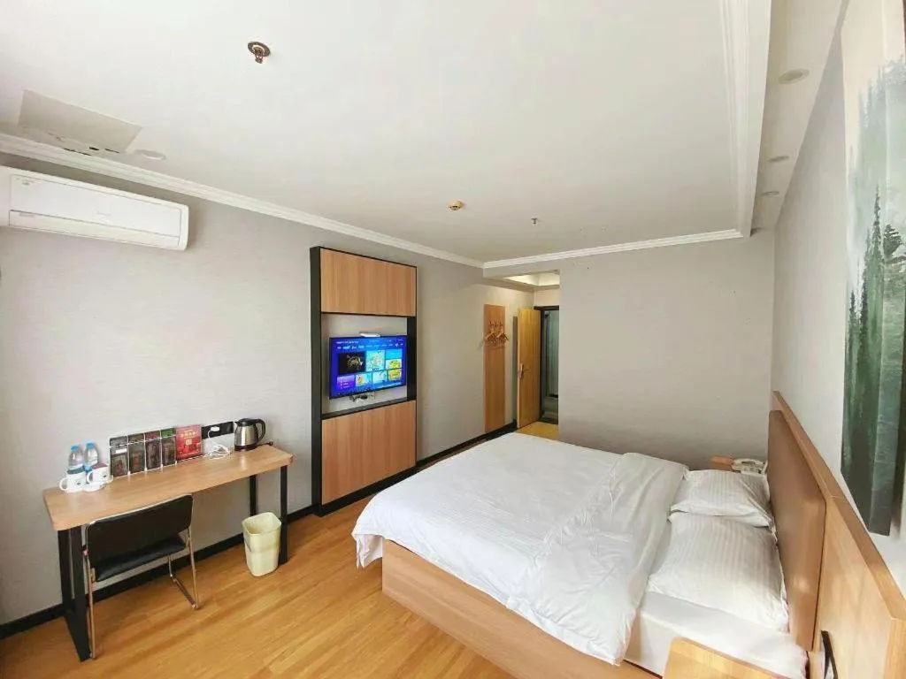 Bed in GreenTree Inn Taizhou New District Hospital of Renmin Hospital Mingliu Express Hotel