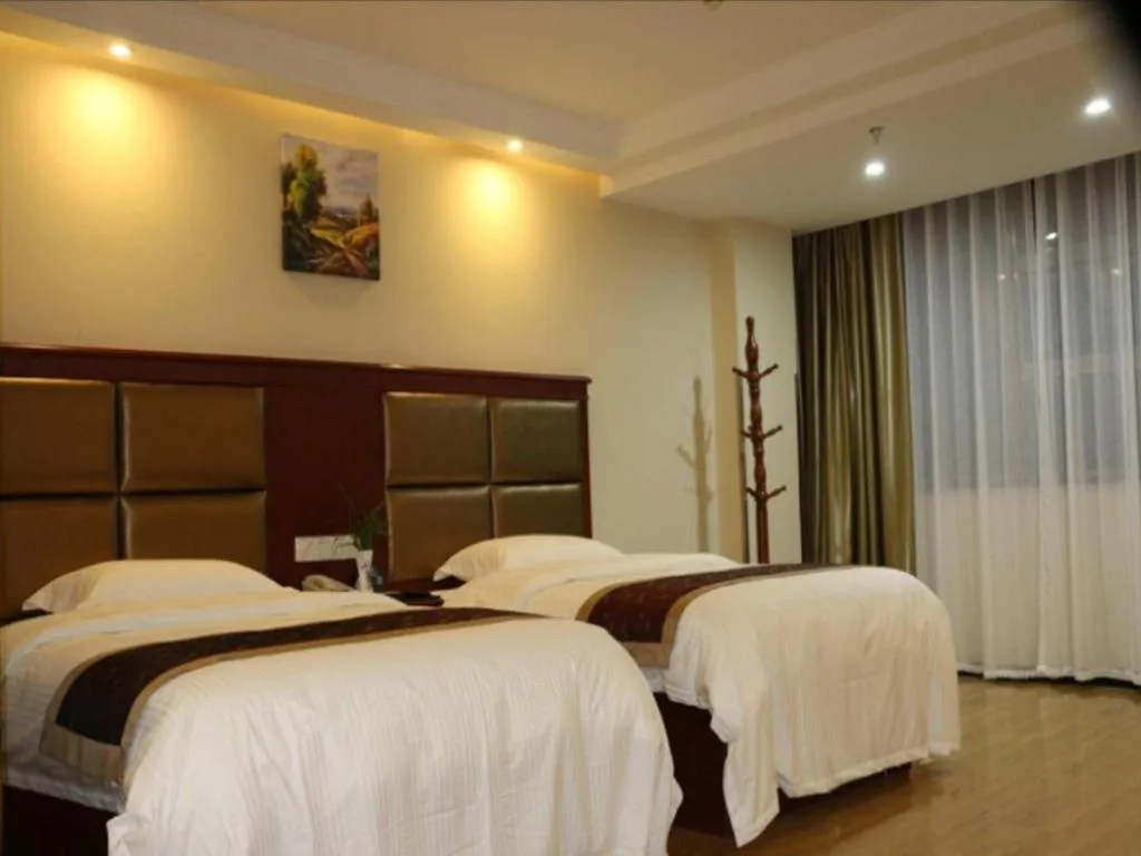 Bed in GreenTree Inn Taizhou New District Hospital of Renmin Hospital Mingliu Express Hotel