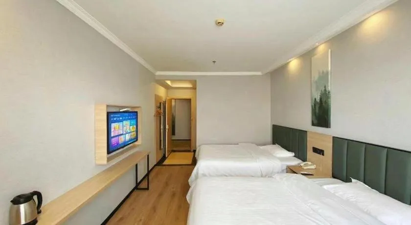 Bed in GreenTree Inn Taizhou New District Hospital of Renmin Hospital Mingliu Express Hotel