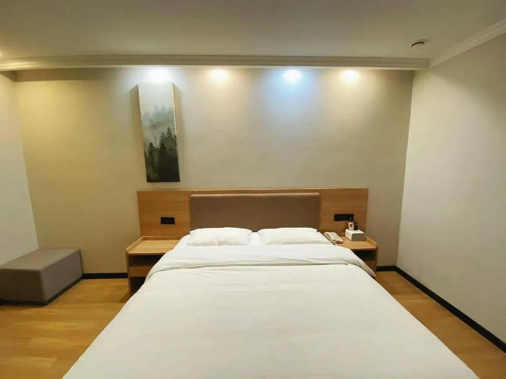 Bed in GreenTree Inn Taizhou New District Hospital of Renmin Hospital Mingliu Express Hotel
