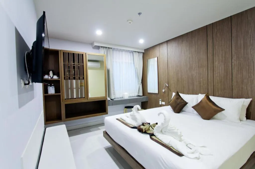 Bed in Elegancy Sansabai Hotel