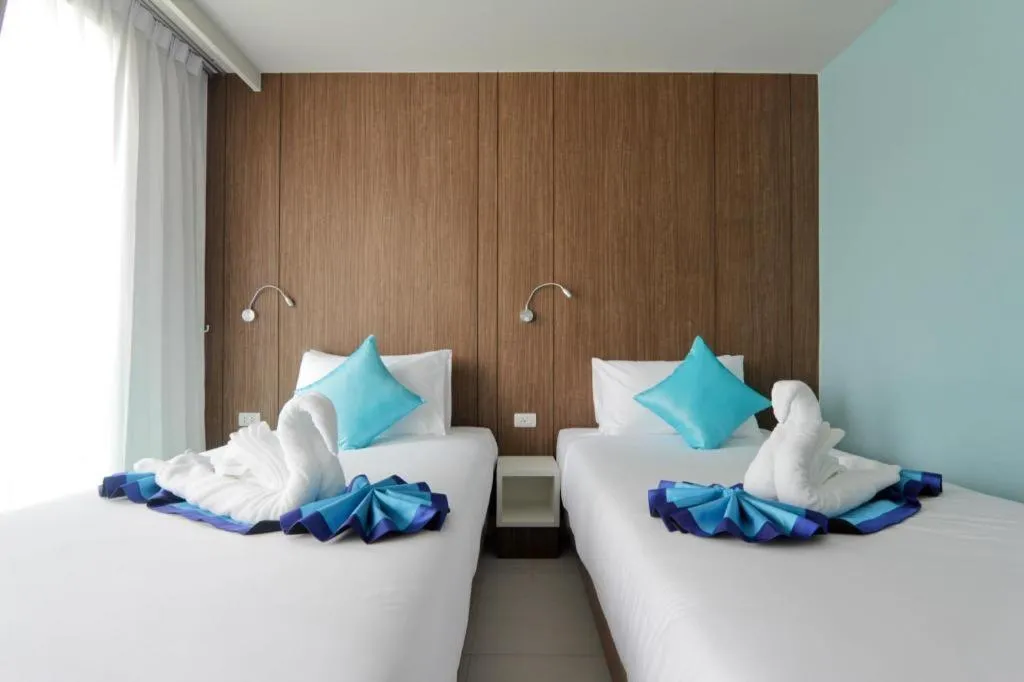 Bed in Elegancy Sansabai Hotel