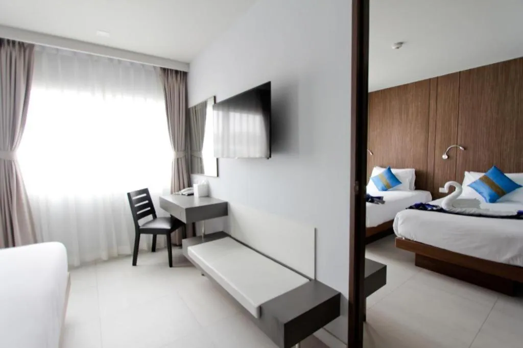 Bed in Elegancy Sansabai Hotel