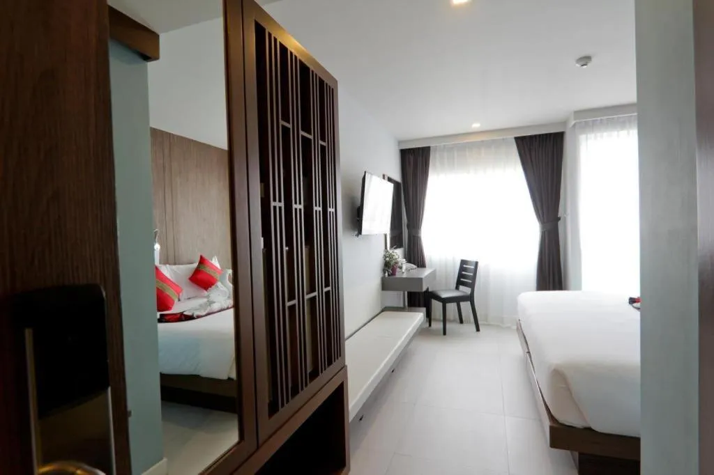 Bed in Elegancy Sansabai Hotel