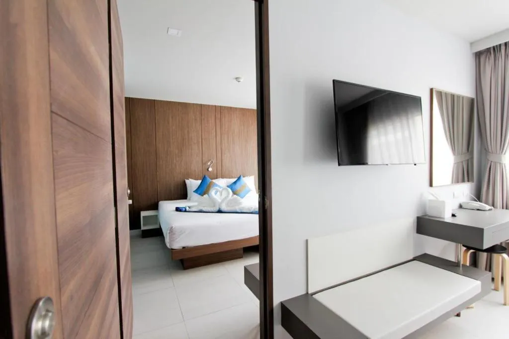 Bed in Elegancy Sansabai Hotel