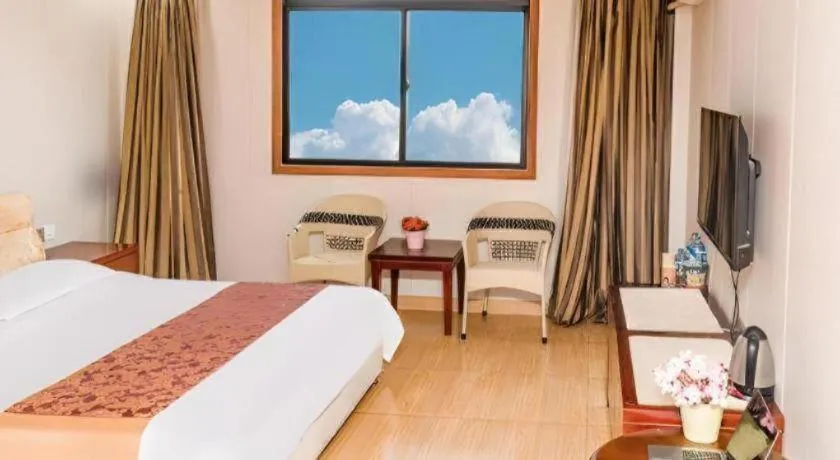 Bed in Jian Guo Grand Hotel