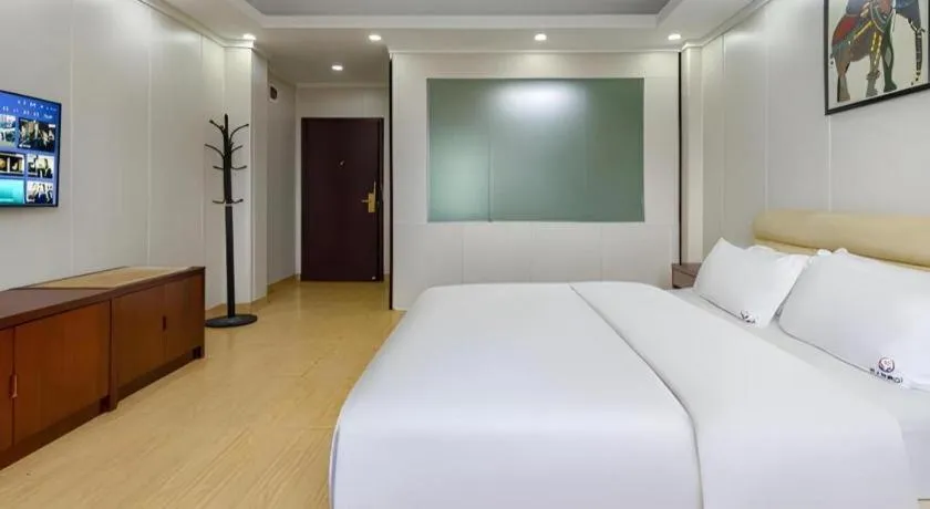 Bed in Jian Guo Grand Hotel