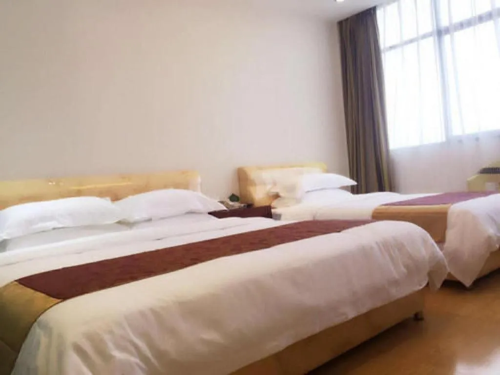 Bed in Jian Guo Grand Hotel