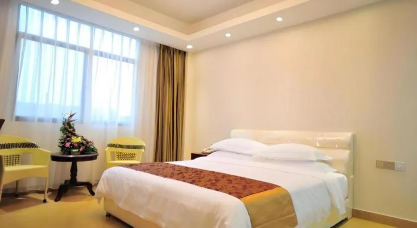 Bed in Jian Guo Grand Hotel