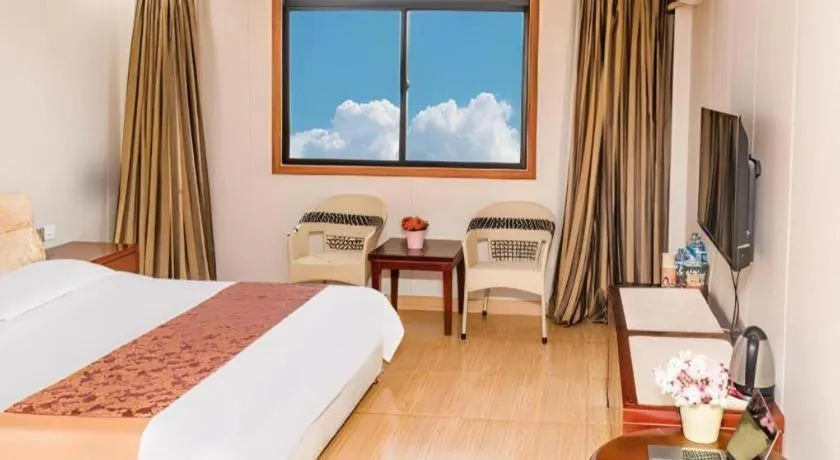 Bed in Jian Guo Grand Hotel