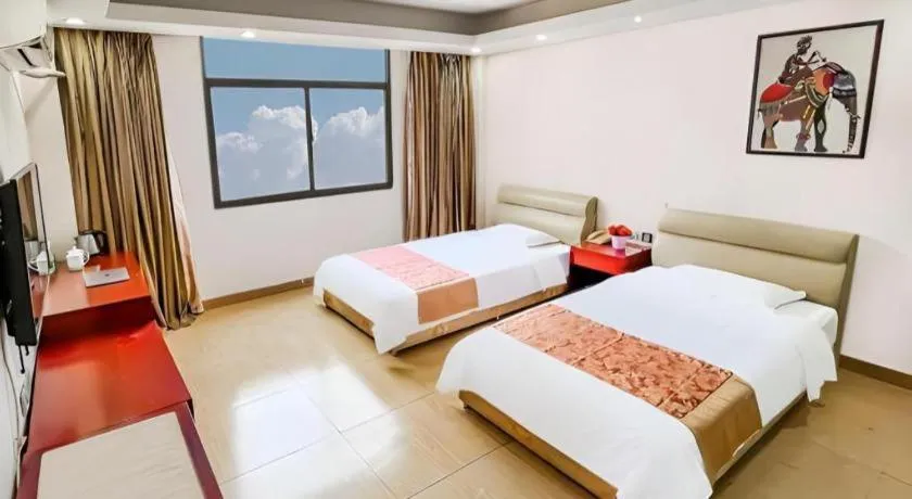 Bed in Jian Guo Grand Hotel