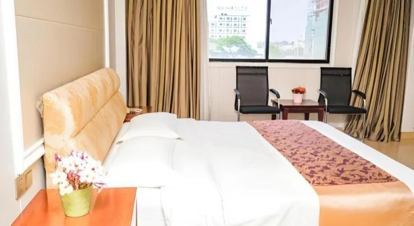 Bed in Jian Guo Grand Hotel