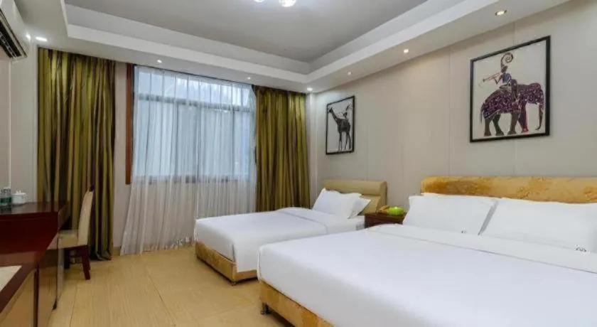 Bed in Jian Guo Grand Hotel