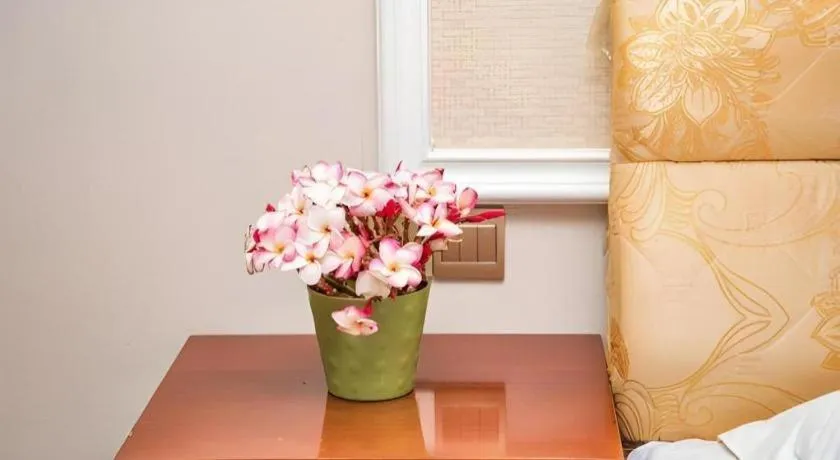 Bed in Jian Guo Grand Hotel