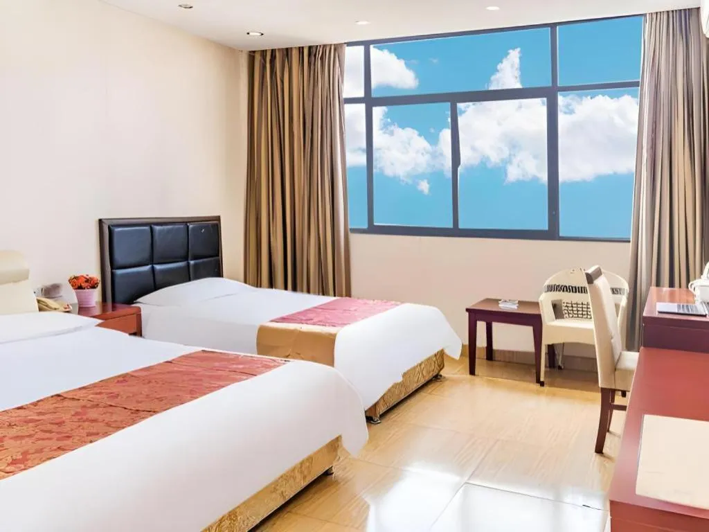 Bed in Jian Guo Grand Hotel