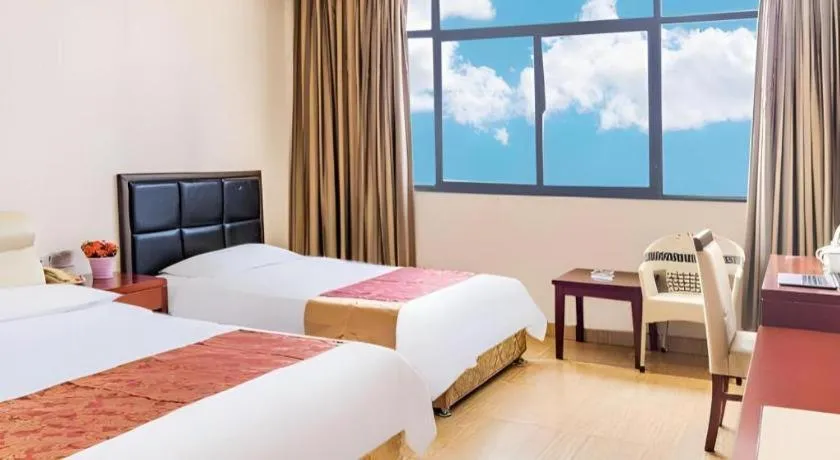 Bed in Jian Guo Grand Hotel