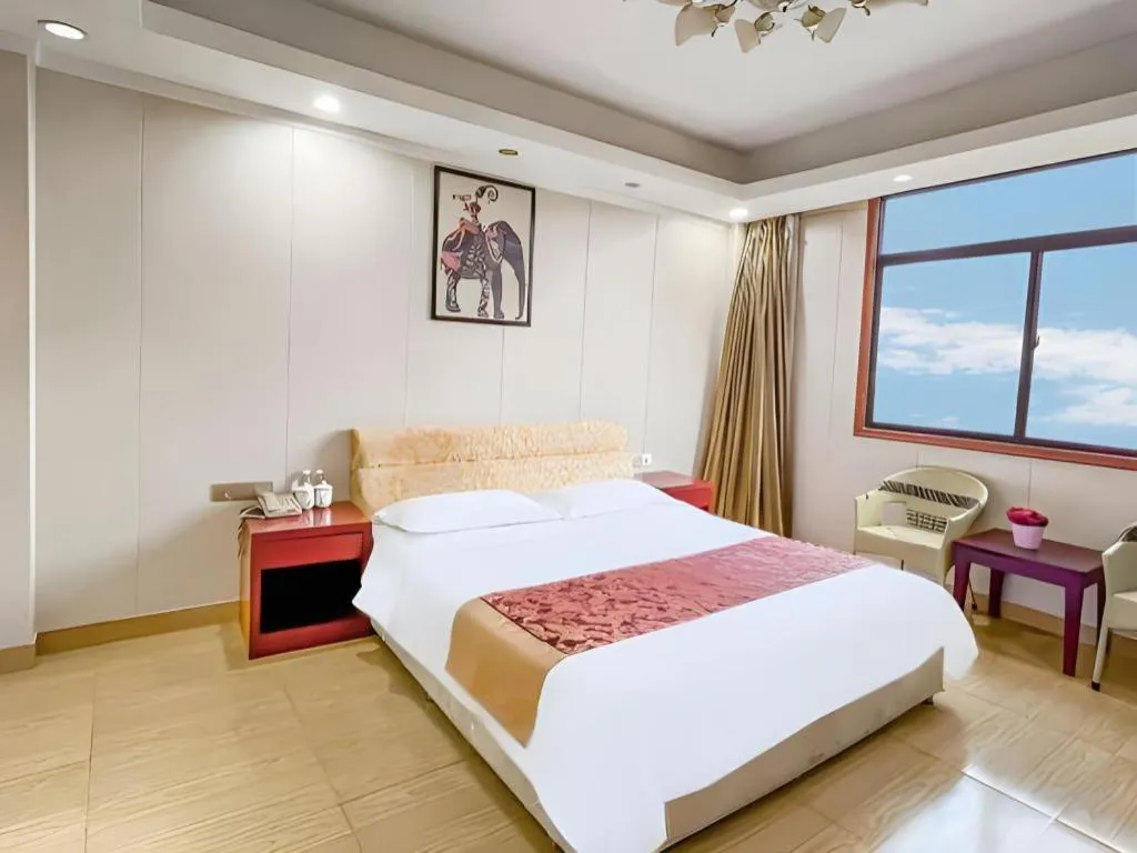 Bed in Jian Guo Grand Hotel