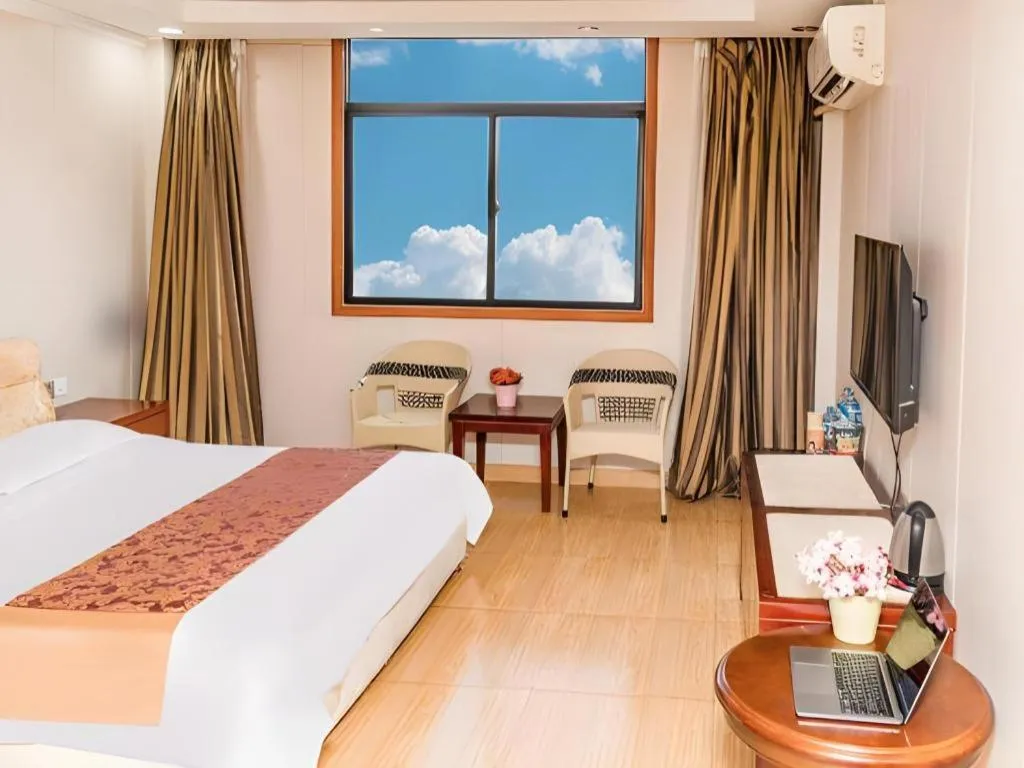 Bed in Jian Guo Grand Hotel