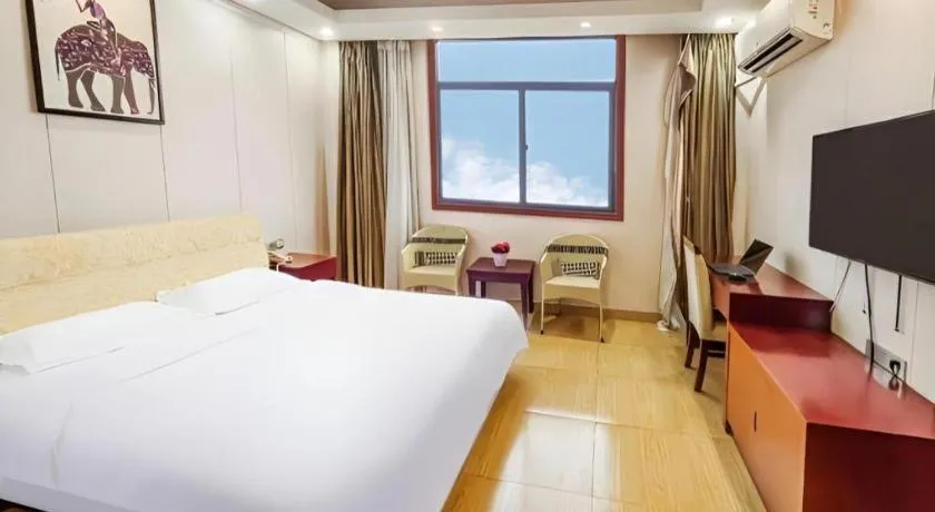 Bed in Jian Guo Grand Hotel