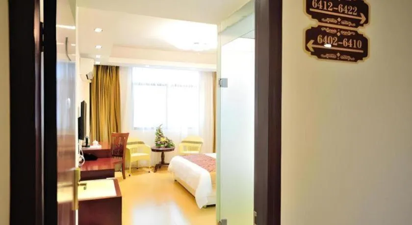 Bed in Jian Guo Grand Hotel