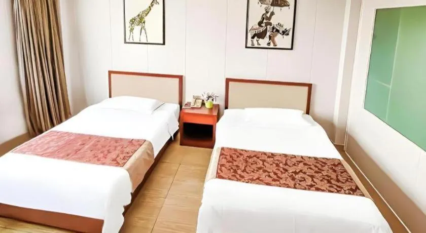 Bed in Jian Guo Grand Hotel