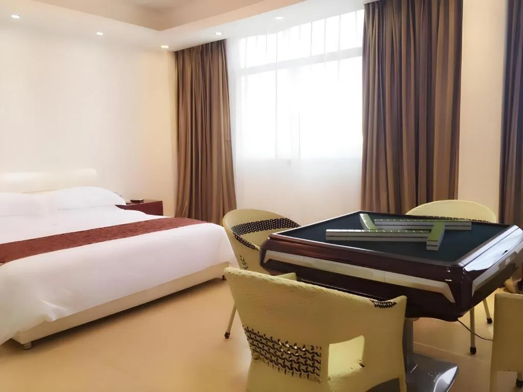 Bed in Jian Guo Grand Hotel