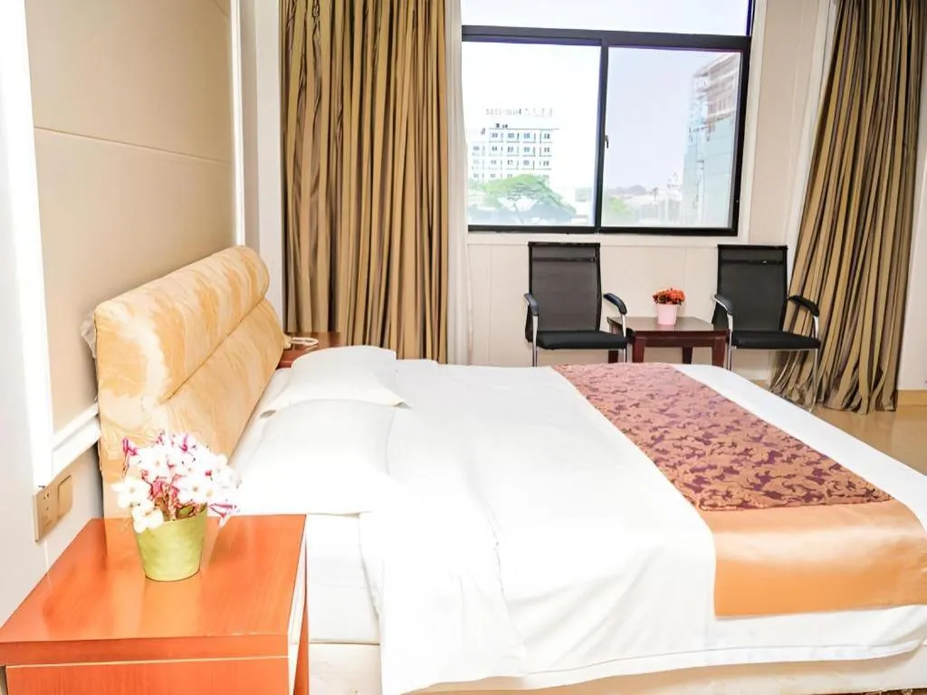 Bed in Jian Guo Grand Hotel