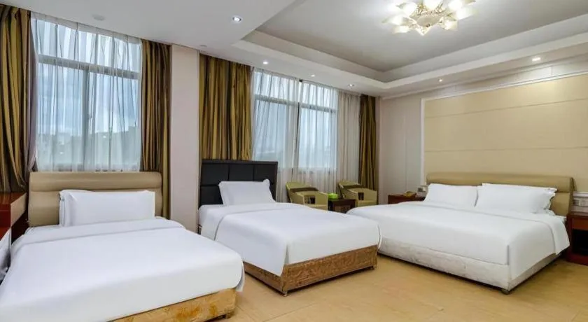 Bed in Jian Guo Grand Hotel