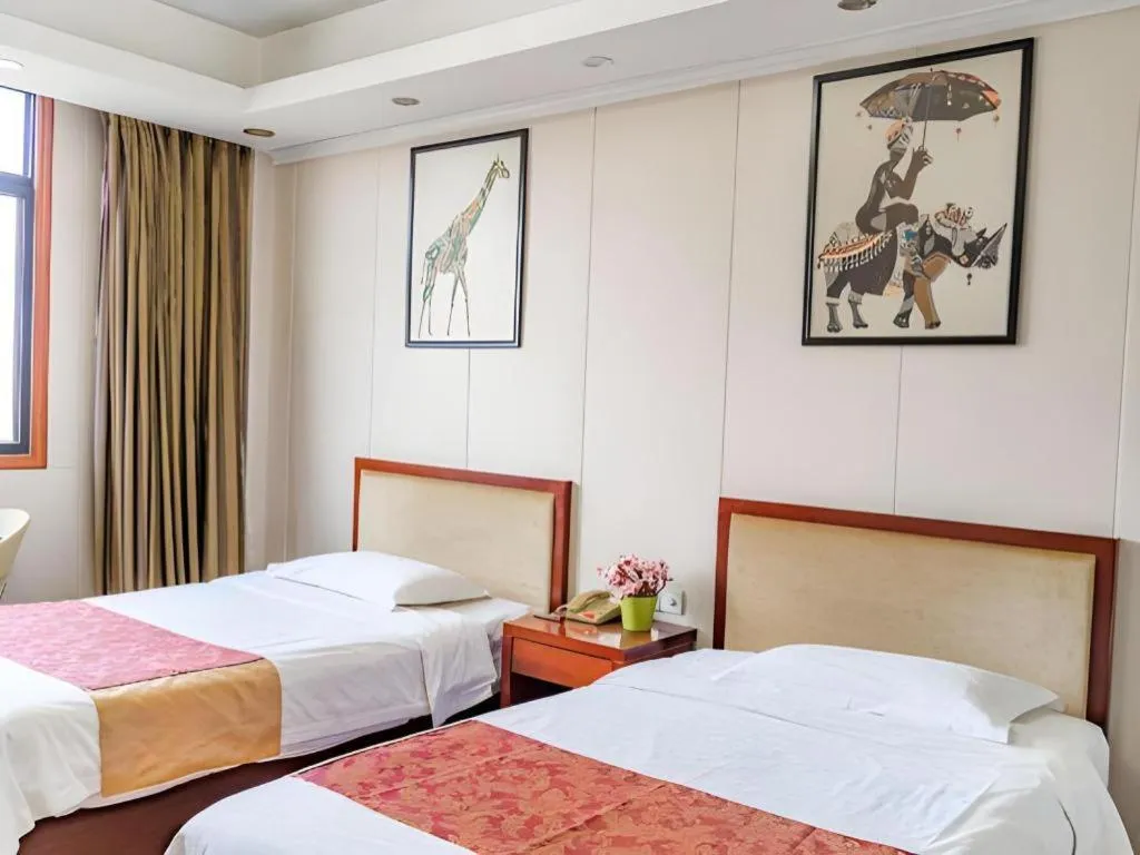 Bed in Jian Guo Grand Hotel