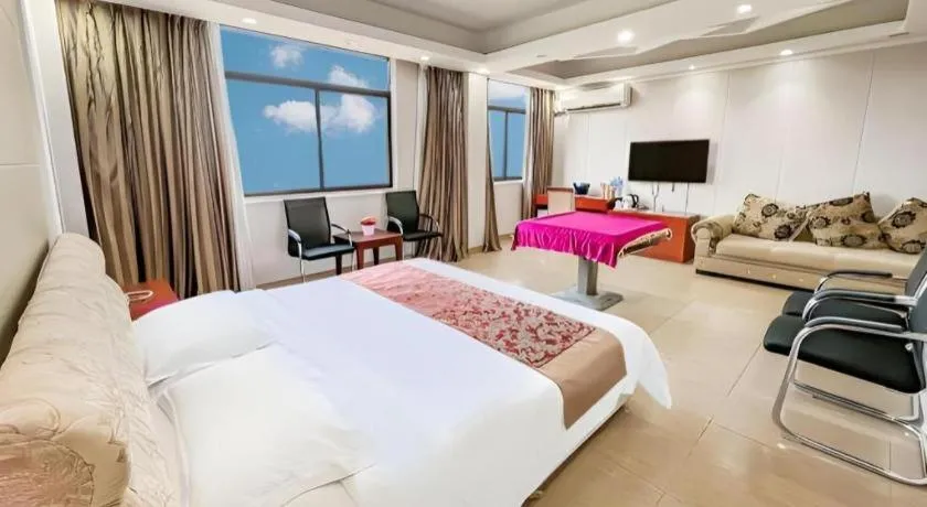 Bed in Jian Guo Grand Hotel